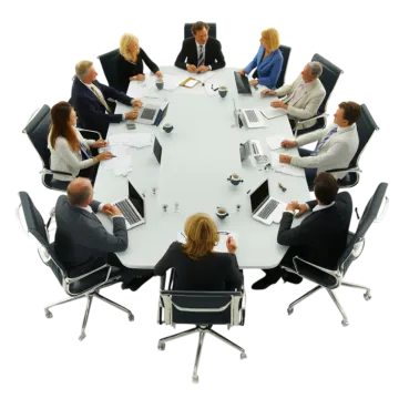 a group of people sitting around a round table