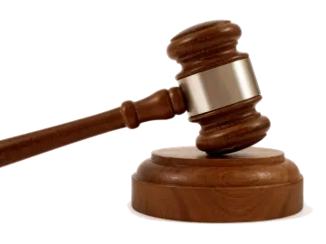a wooden judge's gaven on a white background