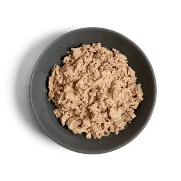 a bowl of tuna on a white background