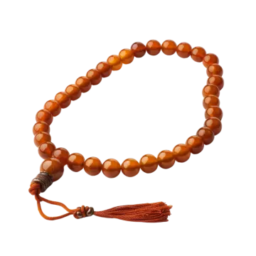 an orange jade bea bracelet with a ta