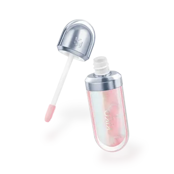 a bottle of liquid with pink glitter on it