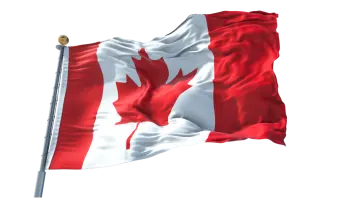a canadian flag flying in the wind