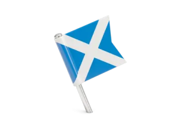 a scottish flag pin on a white background