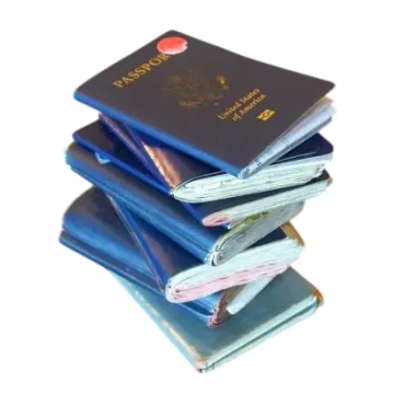 three passports stacked on top of each other passports