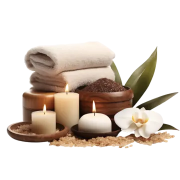 a wooden bowl filled with towels and candles