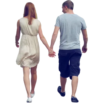 a man and woman walking hand in hand