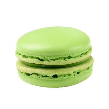 a close up of a green macaron on a white background