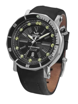 a watch with black leather strap and green numbers
