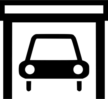 a black and white image of a car in a garage