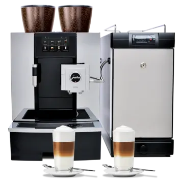 a coffee machine with two cups next to it