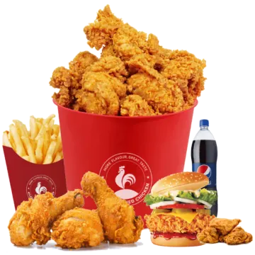 a red bucket filled with fried chicken and fries