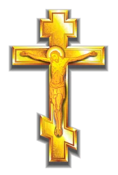 a golden cross with jesus on it