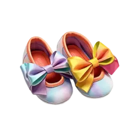 a pair of baby shoes with colorful bows