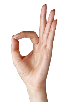 a person's hand making a peace sign