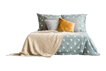 a bed with two pillows and a blanket