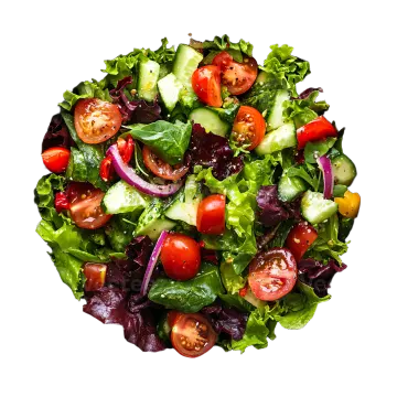 a black bowl filled with salad greens and tomatoes