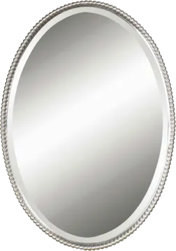 a round mirror with bea trim around the edge