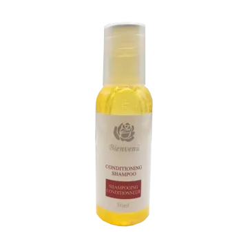 a bottle of coconut oil on a white background