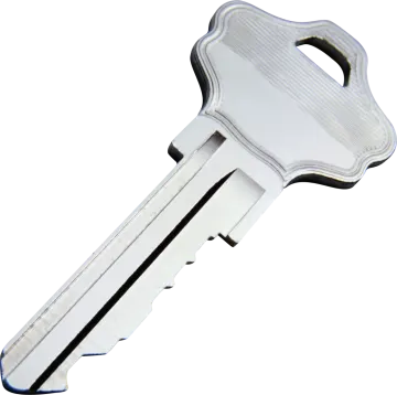 a silver key on a white background