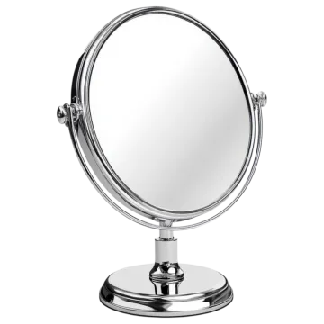 a round mirror on top of a stand
