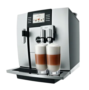 a coffee machine with two cups of coffee