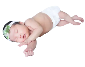a baby in a white diaper with a green headband