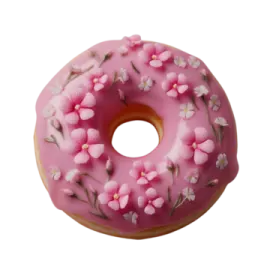 a pink donut with white flowers on it