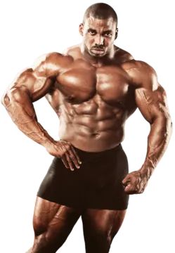 a man in black shorts posing with his hands on his hips