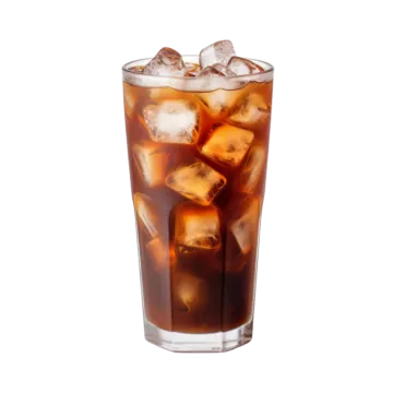a tall glass filled with ice and cola