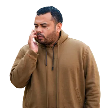 a man wearing a brown hoodie