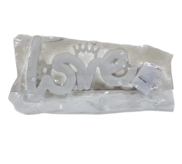 a white plastic bag with the word love on it