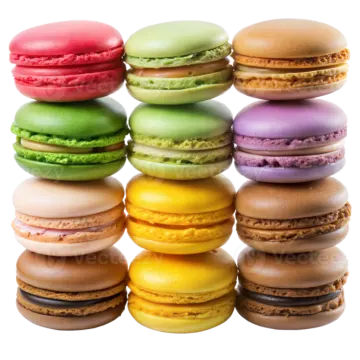 a pile of colorful macaros on white background