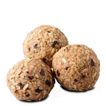 three balls of oat on a white surface