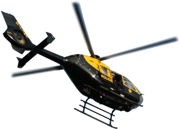 a black and yellow helicopter flying in the sky