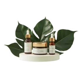 a white box with two bottles of serums and a green leaf