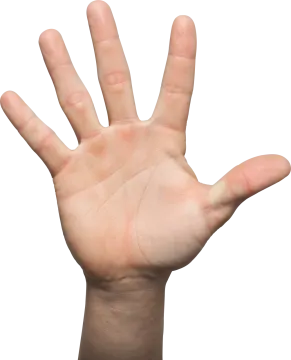a person is holding their hand up in the air