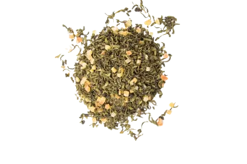 a pile of green tea on a white background