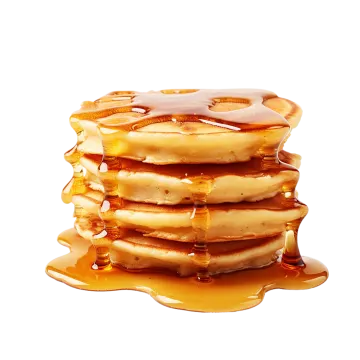a stack of pancakes with syrup on top