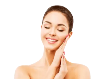 a woman smiling and touching her face with her hands