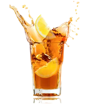 a glass filled with orange juice and ice