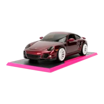 a red toy car on a white background