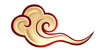 a gold elephant head with red and white stripes