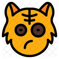 a yellow cat with black eyes and brown ears