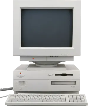 an old computer with a keyboard and mouse