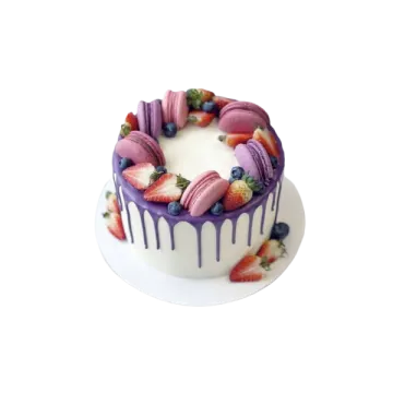 a white cake with purple icing and fruit on top
