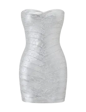 a white dress with metallic foil on it