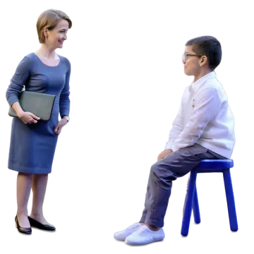 a woman sitting on a stool