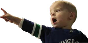 a little boy pointing his finger at something