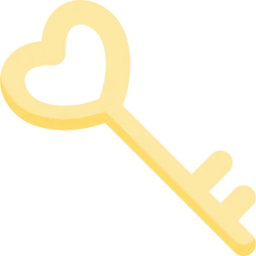 a gold key with a heart shaped key