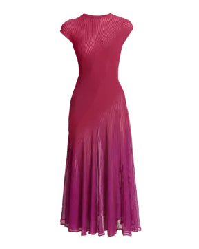 a woman in a pink dress